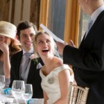 Bride laughing during speeches