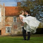 Groom lifting the bride at Bruisyard